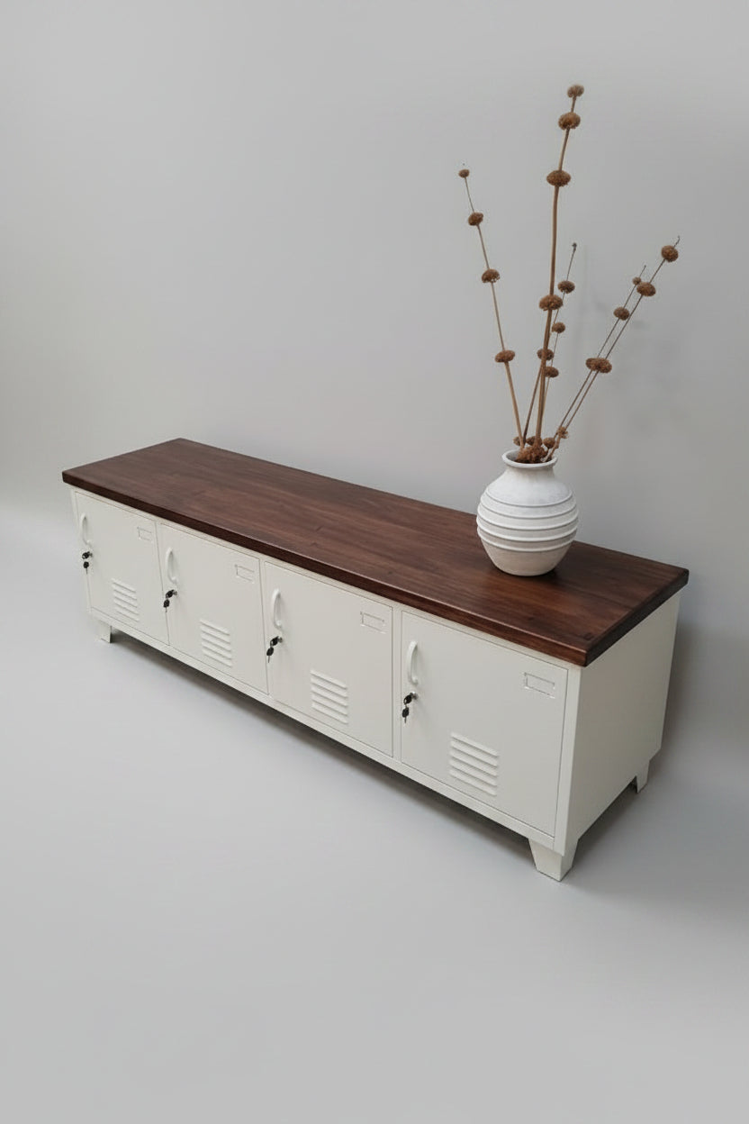 Wooden bench with white storage lockers and decorative items on a light gray floor.