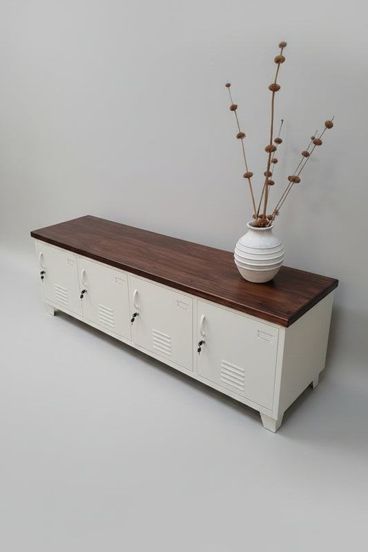 Wooden bench with white storage lockers and decorative items on a light gray floor.