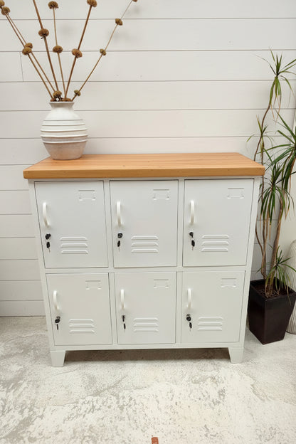 6 Door locker - white with Rimu top against a shiplap wall