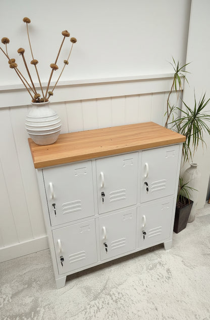 6 Door locker powder coated White with a Recycled Rimu top against a white paneled wall