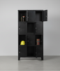 Black 12 Door Industrial Metal Locker Cabinet, some doors open showing storage use