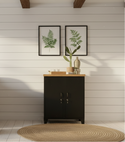 Black double side cabinet with oak top locks and 2 handles, a potted plant on top of the cabinet.