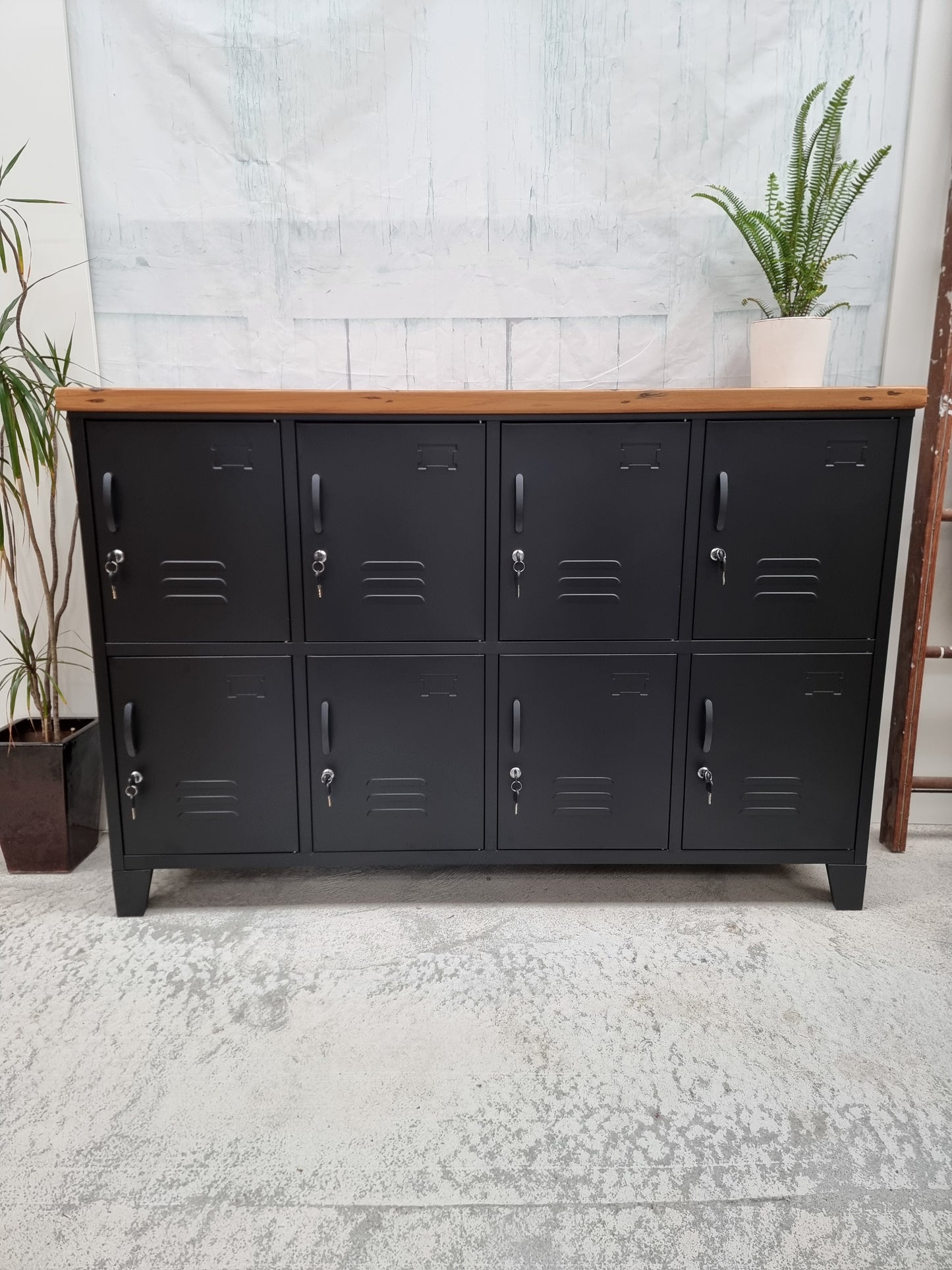 Black industrial metal 8 door locker with Rimu top