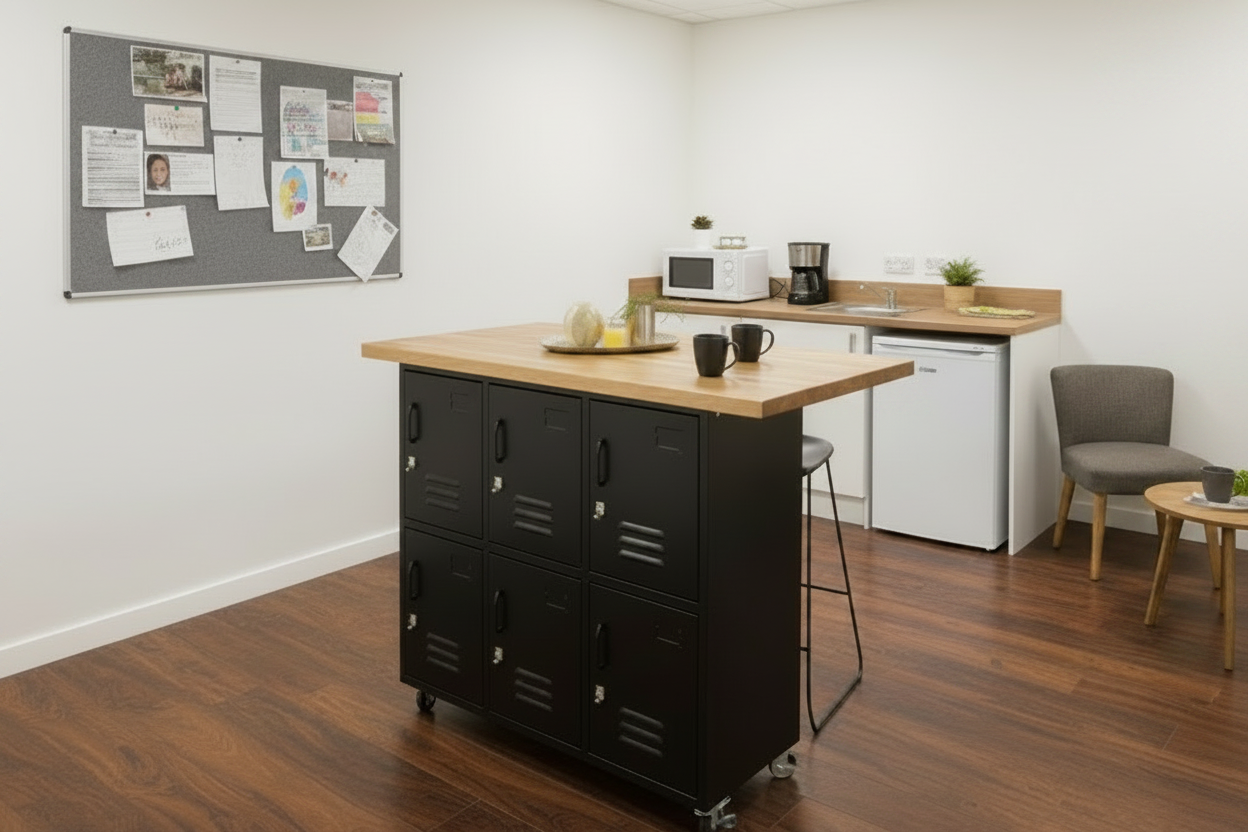 Black metal 6 Door locker with Oak island top, set in staff room