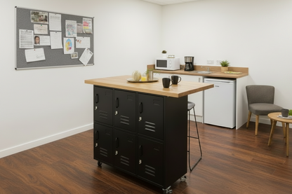 Black metal 6 Door locker with Oak island top, set in staff room