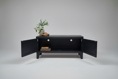 Black metal TV cabinet with open doors showing inside with cable holes