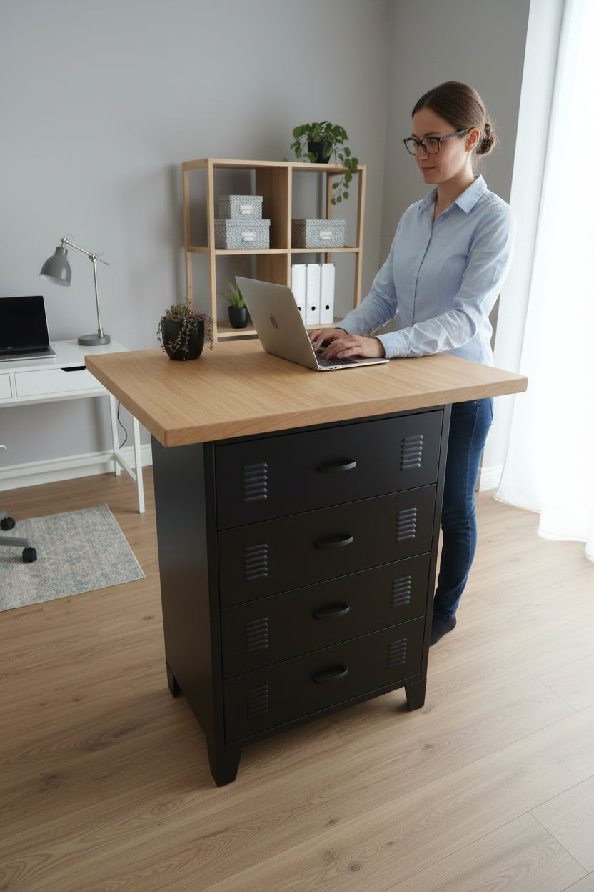 Black metal drawer cabinet with Rimu top in a office setting