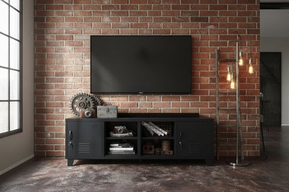 Black metal entertainment console with open display shelves and a TV against a brick wall in a modern room.