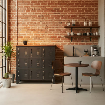 Black staff lockers, nine doors and dark rimu top in staffroom against a brick wall
