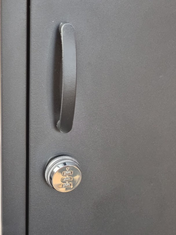 Combination lock on the door of Black 6 Door locker