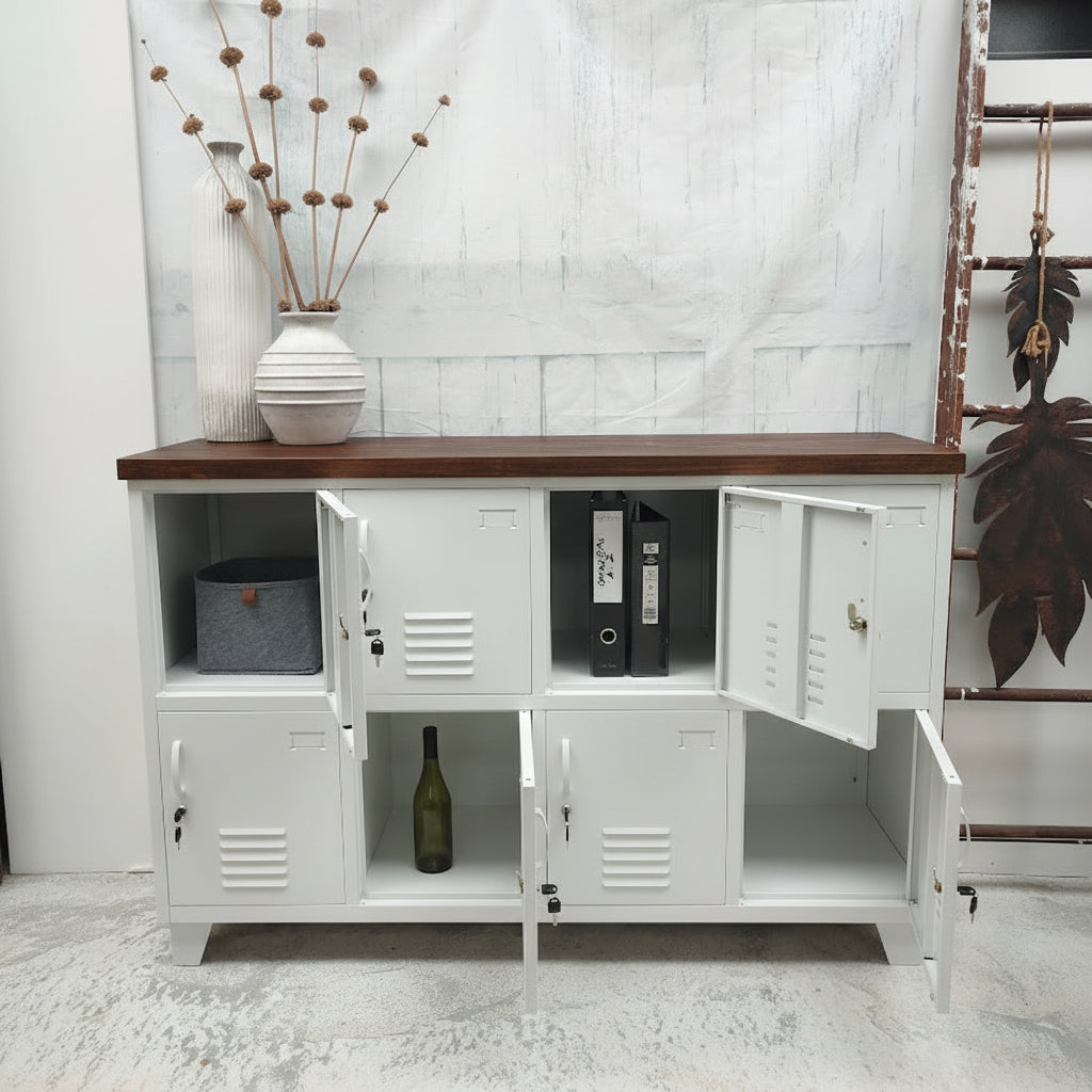 White metal storage cabinet locker with dark oak wooden top, open doors displaying books and a bottle