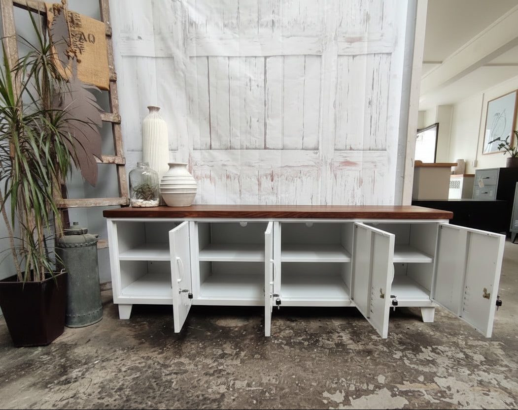 Large White metal TV cabinet with storage unit with Dark Rimu top with open doors in a rustic interior setting