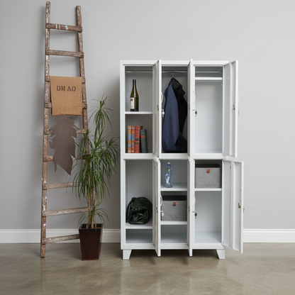 Open tall White metal 6 door locker with various items inside against a gray wall.