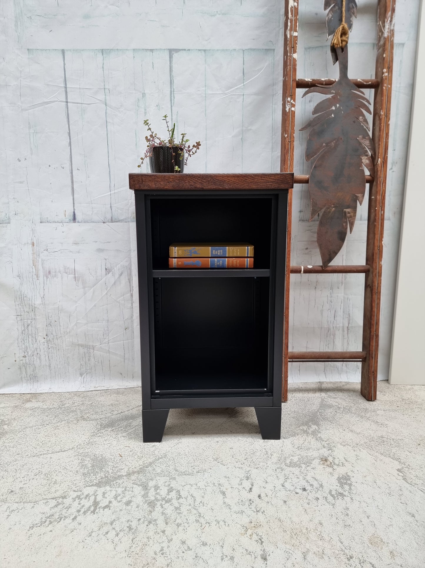 Small Black industrial metal bookshelf  with Dark stained oak top