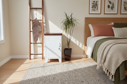 Small White metal cabinet with Dark Rimu top by the bed
