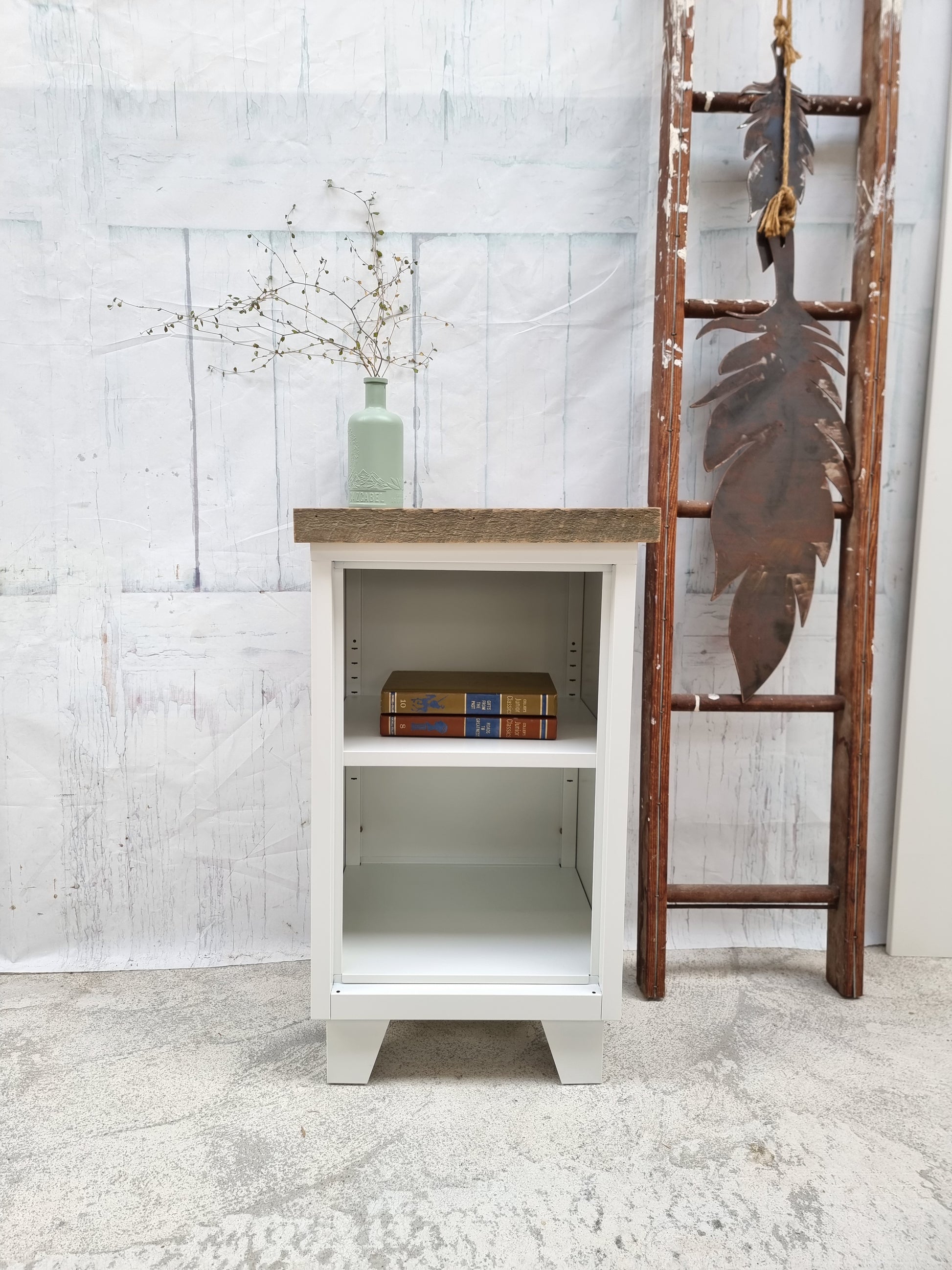 Small White metal industrial shelf with pallet top
