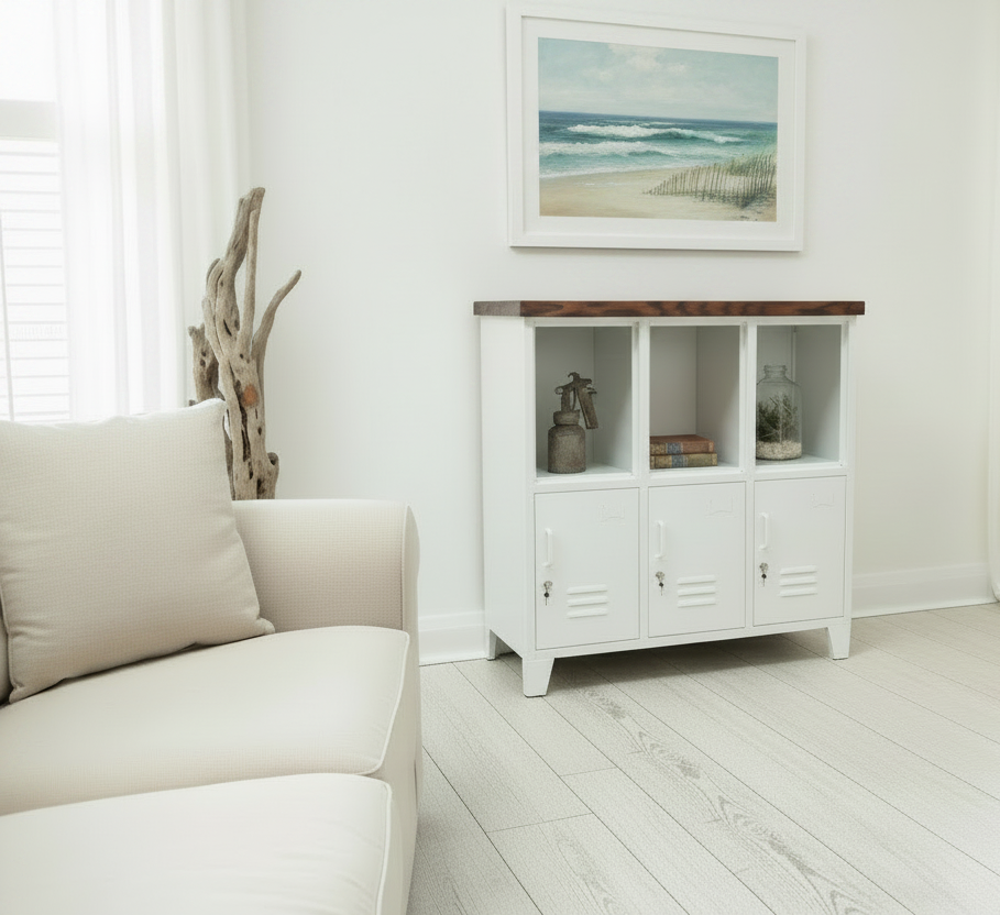 White metal cabinet with wooden Dark Oak top with open display in a room with plants and decorative items.