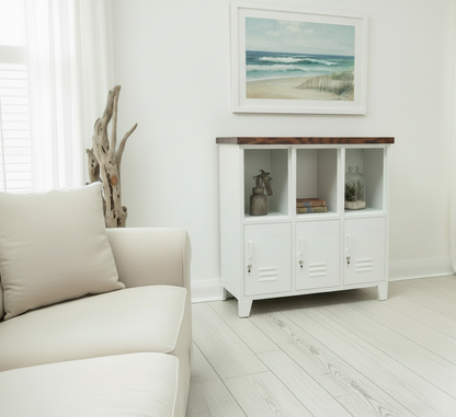 White metal cabinet with wooden Dark Oak top with open display in a room with plants and decorative items.