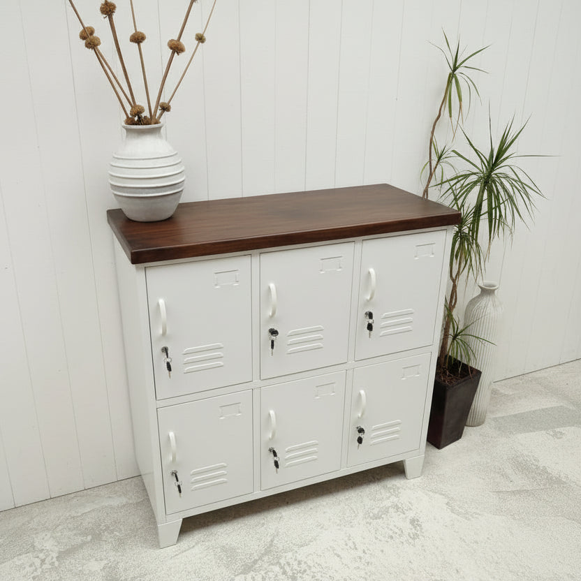 White 6 Door locker cabinet with Dark stained Recycled Rimu top in a home for storage