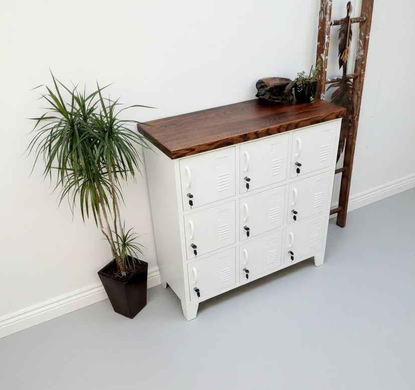 White 9 door metal locker cabinet with dark oak top. Highlighting wooden top