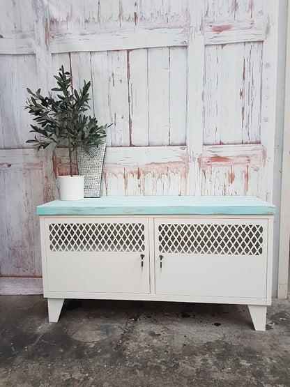White Industrial metal TV cabinet with Tongue and groove turquoise top. Lockable storage with sytle