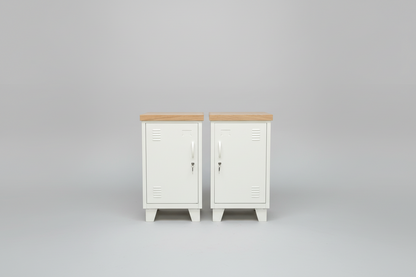 Two white mini lockers with wooden tops on a gray background