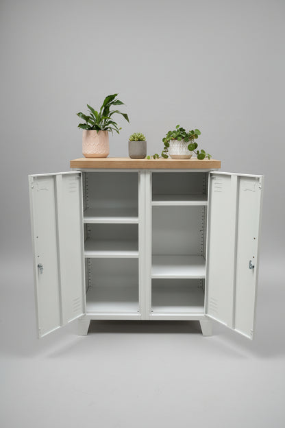 White double side cabinet with Oak top. Showing open doors with adjustable shelves inside
