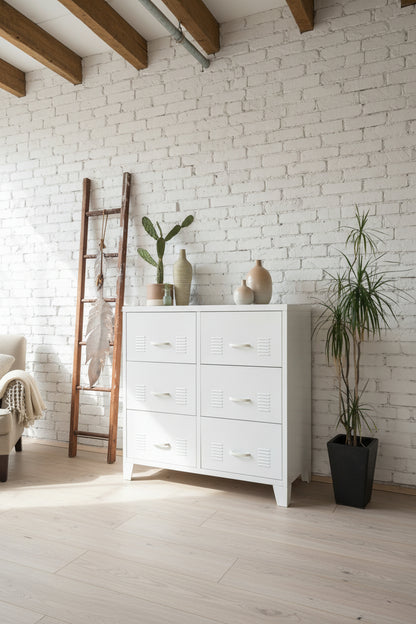 White metal 6 Drawer tallboy in a room with plants and decor.
