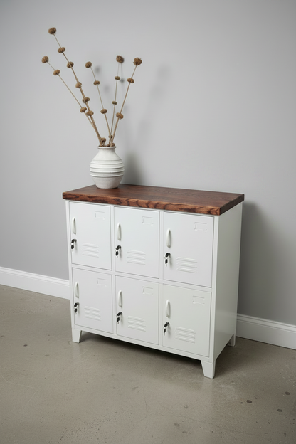 White metal 6 door locker cabinet with Dark oak top against a grey wall