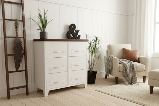 White metal 6 drawer cabinet with a Dark stained RImu top in lounge room