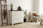 White metal 6 drawer cabinet with a Dark stained RImu top in lounge room