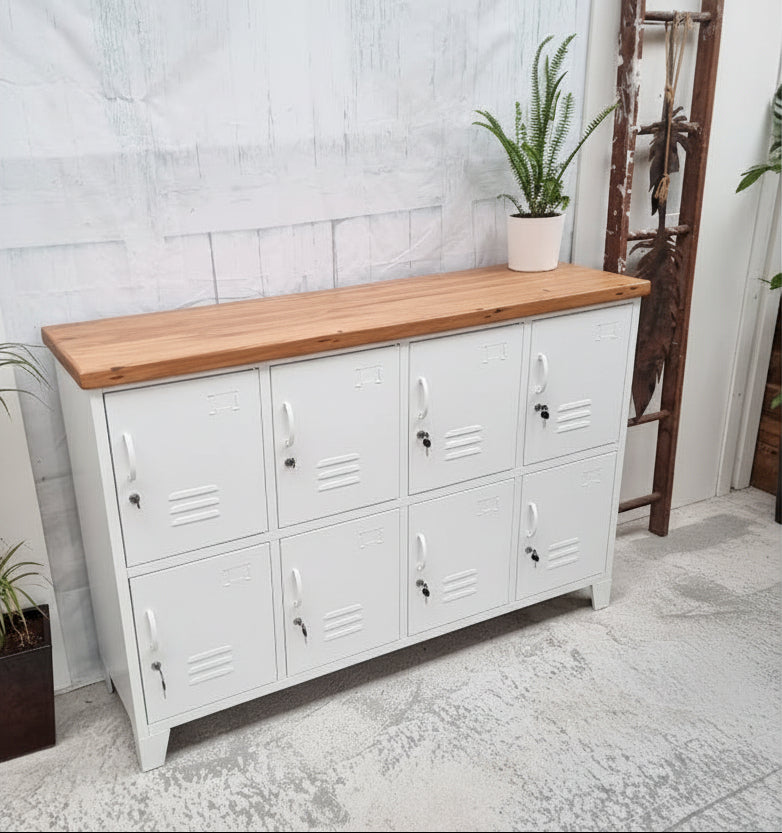 White metal 8 door locker cabinet with Rimu top. Showing the great lockable storage