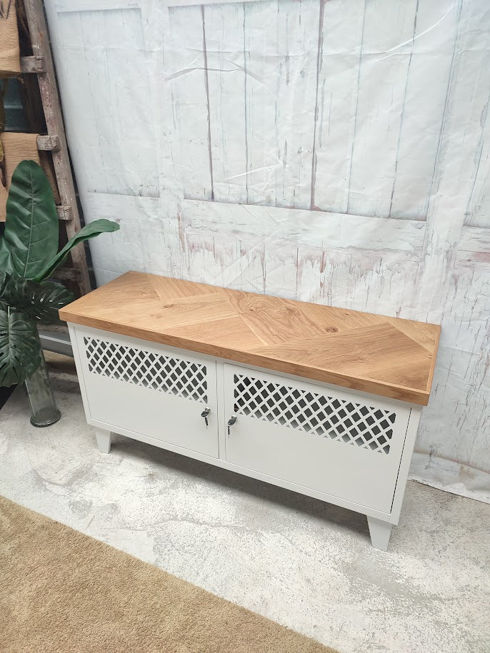 White metal TV cabinet with herringbone top