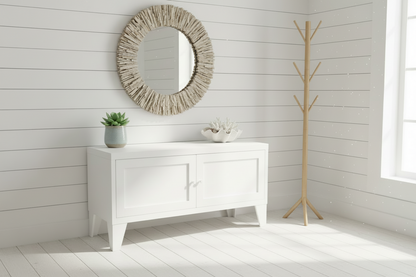 White metal bench in entranceway to store shoes