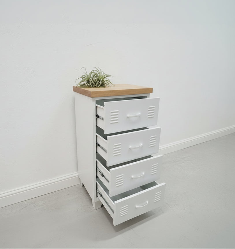 White metal locker-style dresser with 4 drawers and an Oak wooden top against a light gray wall.