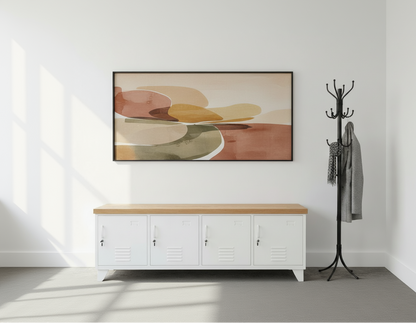 White metal storage bench with Oak top in an entry way with abstract art and coat rack.