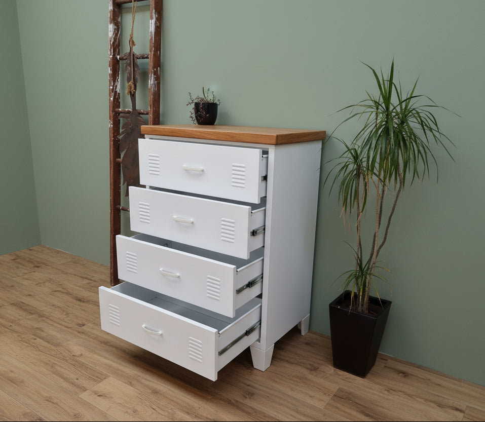White metal tallboy cabinet with 4 drawers and a RImu top on a green wall