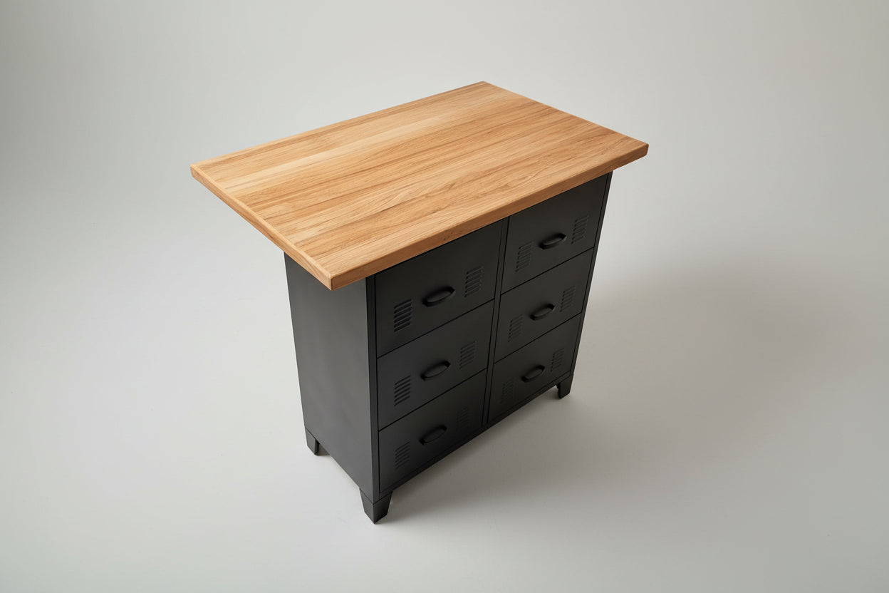 Wooden top kitchen island with black metal drawers