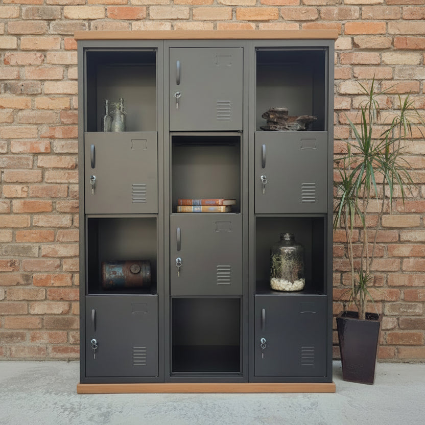 A black industrial bookshelf made of metal in a checkerboard style with hidden storage and a Rimu top and plinth