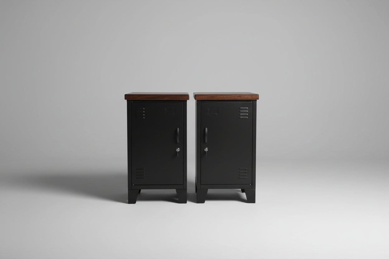 two black mini lockers with wooden tops on a plain background