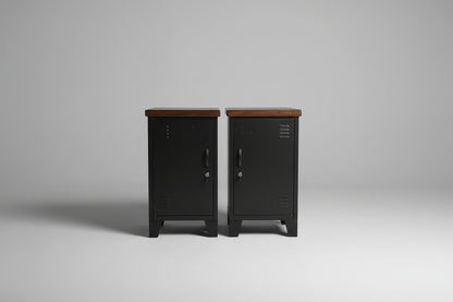 two black mini lockers with wooden tops on a plain background