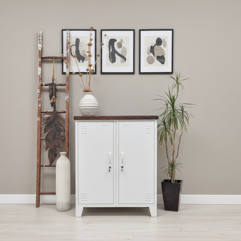 A white double side cabinet with a dark stained oak top in a light bright stylish hallway
