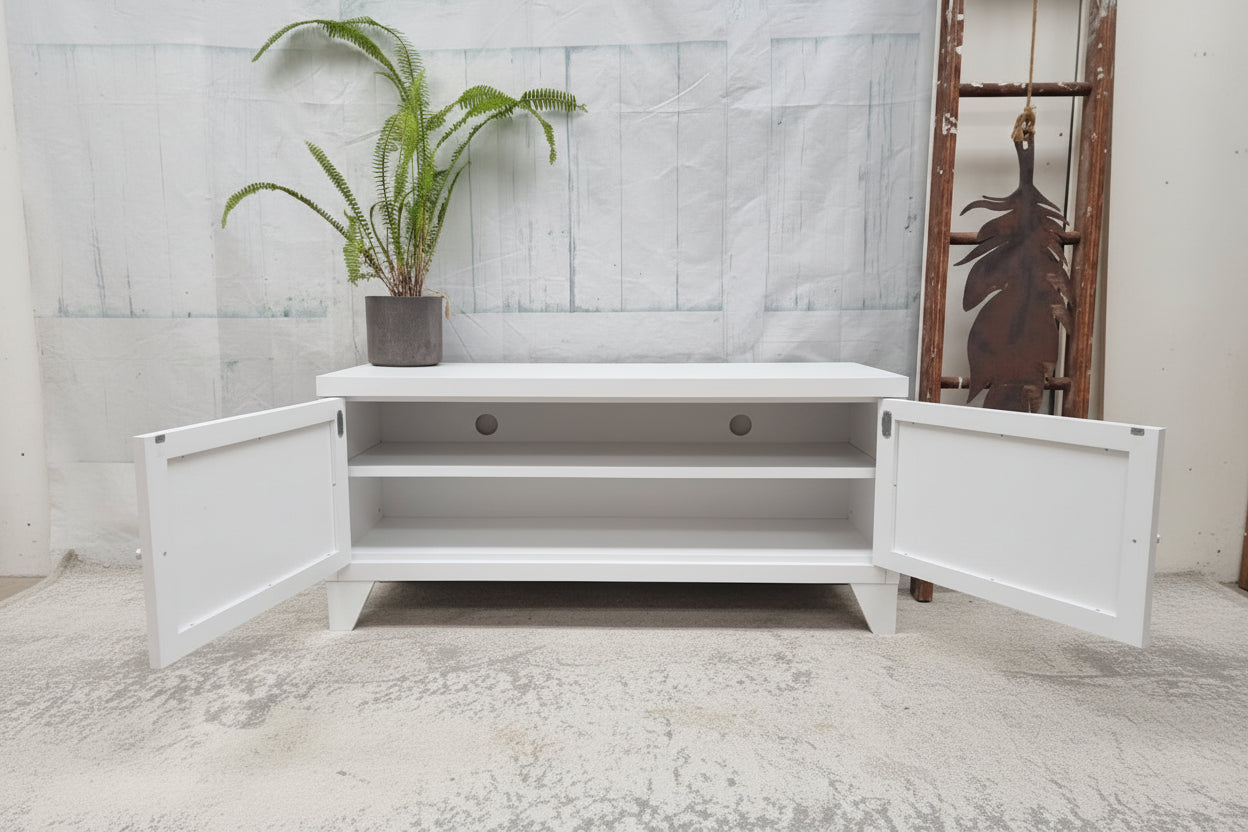 white industrial metal TV cabinet with open doors showing in side an adjustable shelf and cable holes 