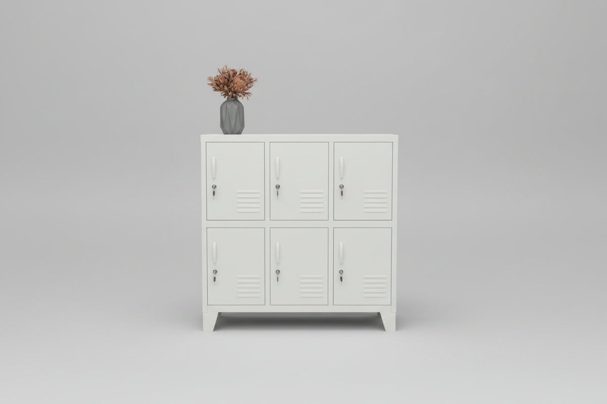 A white metal 6-door locker cabinet with six individual lockable compartments, grey studio background