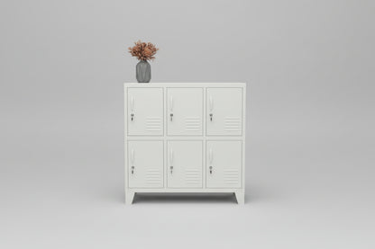 A white metal 6-door locker cabinet with six individual lockable compartments, grey studio background
