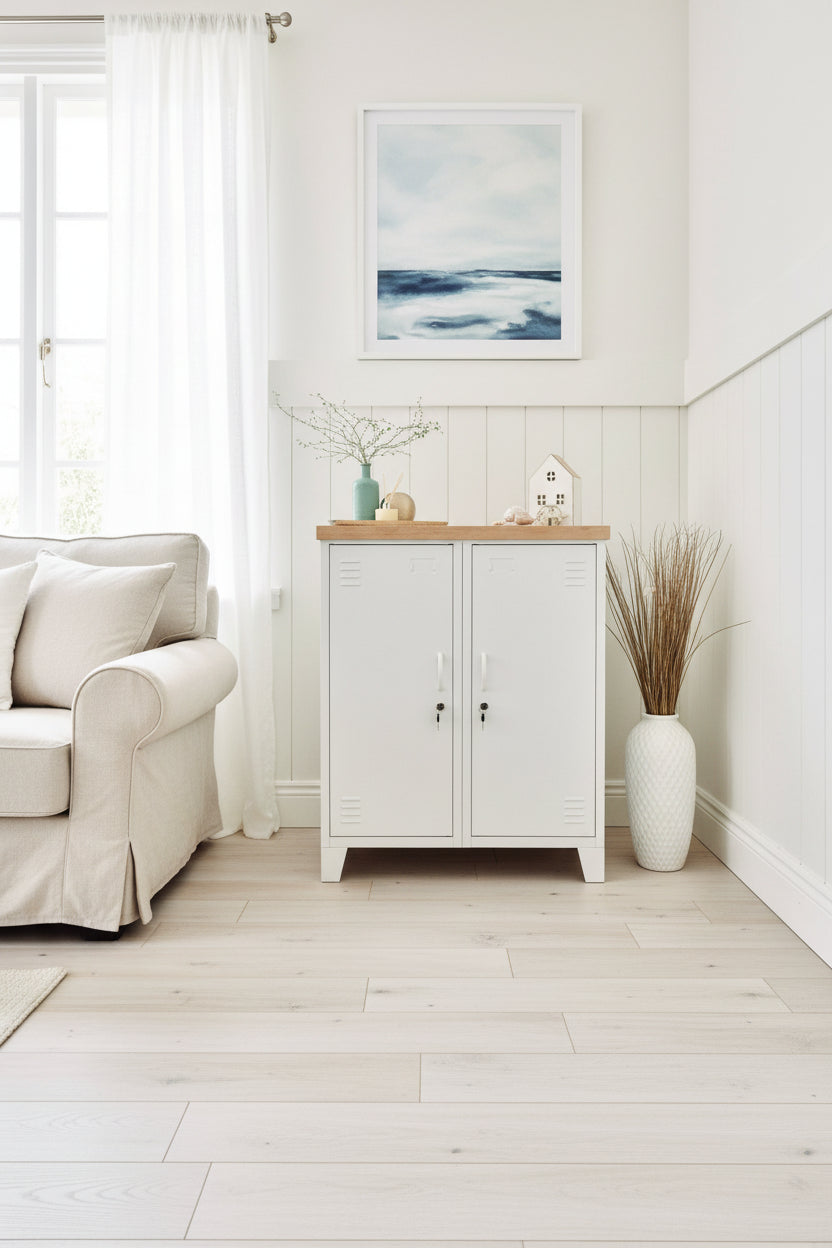A white double side cabinet with a oak top in a light bright stylish loungeroom 