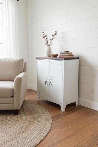 A white double side locker cabinet with a dark stained oak top in a light bright stylish loungeroom 