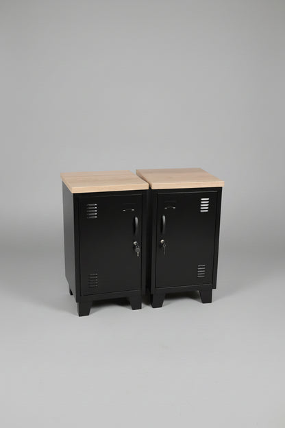 A pair of Small black metal cabinets with Oak tops