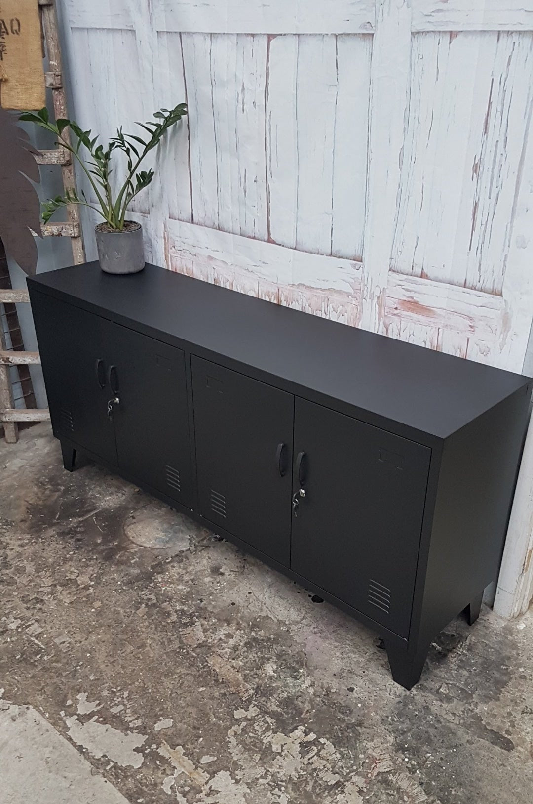 A Industrial Black metal office credenza sideboard cabinet showing the powder coated top