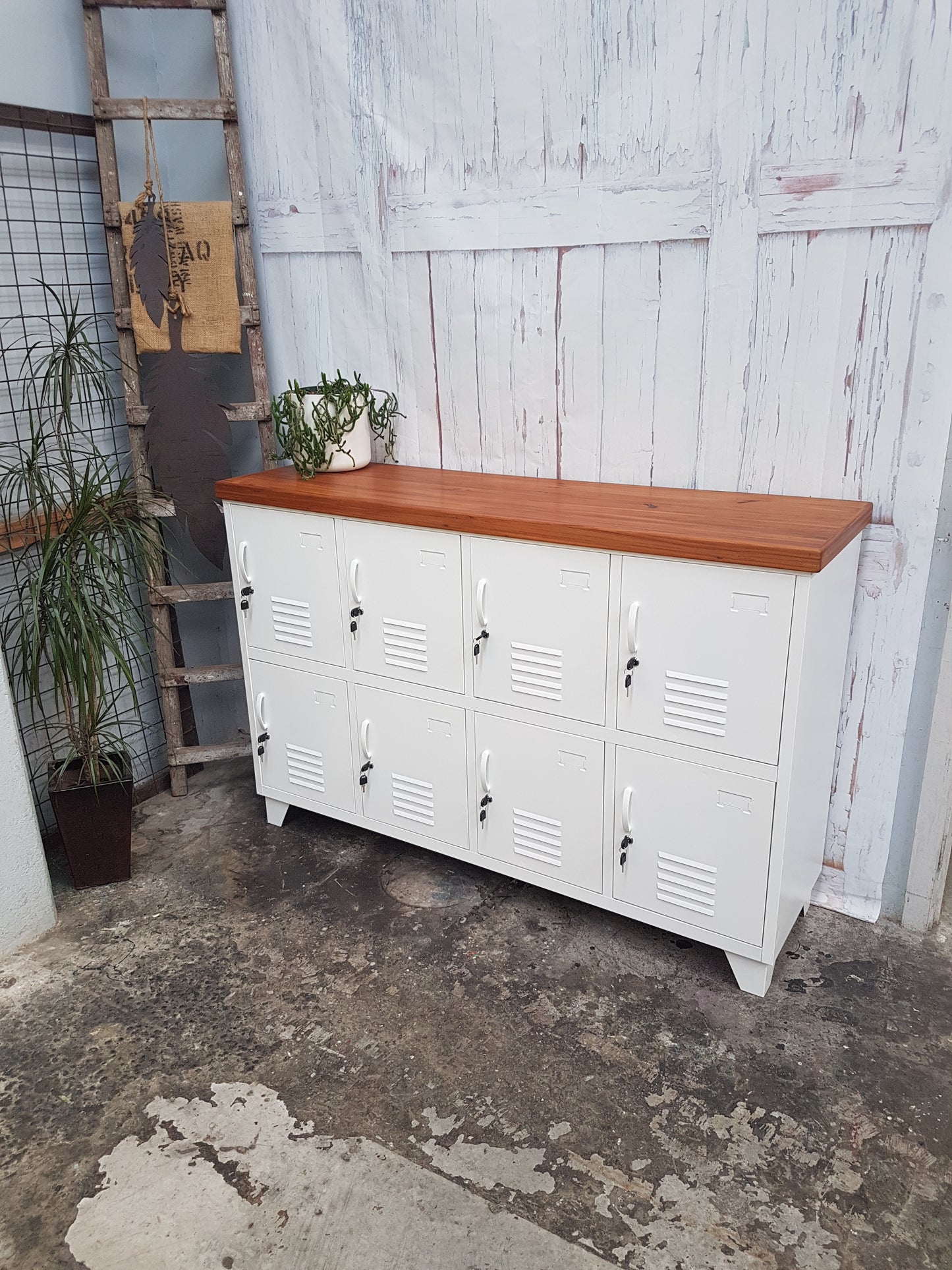 Oil Recycled Rimu top on white 8 door locker cabinet